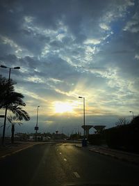 Empty road at sunset