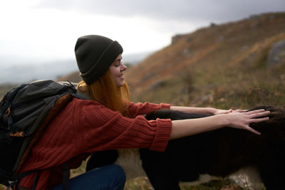 Side view of young woman looking away