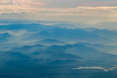 Scenic view of mountains against sky during sunset