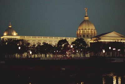 View of city lit up at night