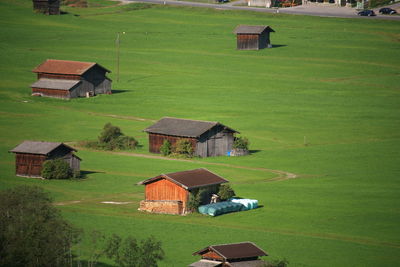 High angle view of cottage on field