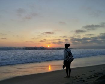 Scenic view of sea at sunset