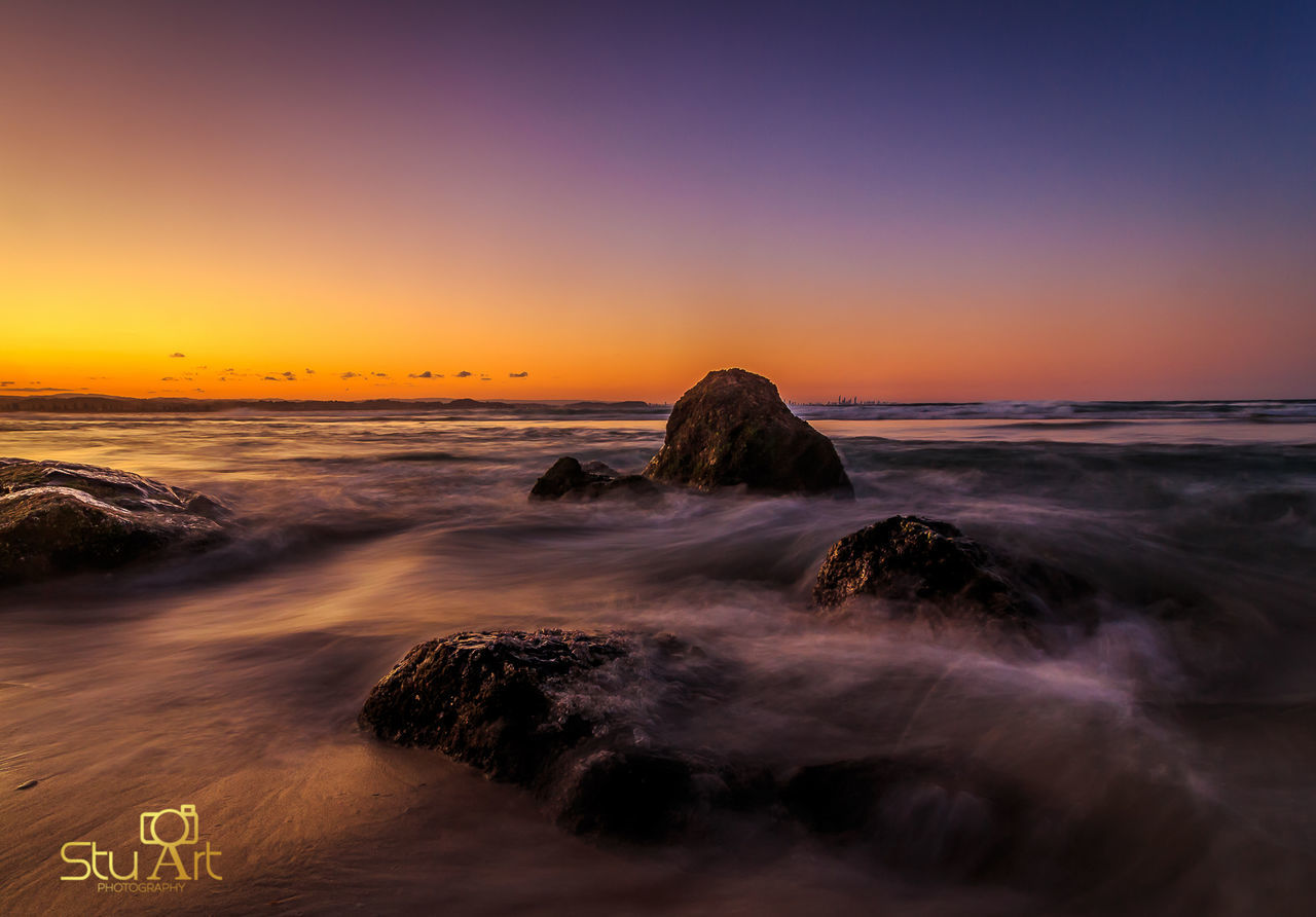 VIEW OF SEA AT SUNSET