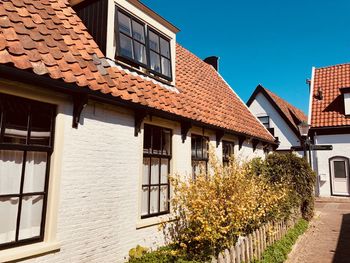 Low angle view of residential building against sky