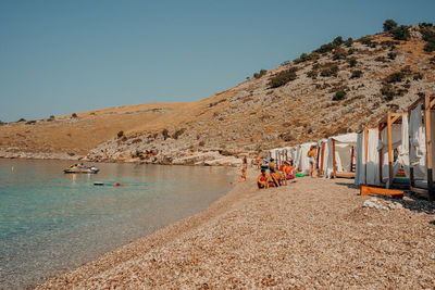 Scenic view of beach against clear sky