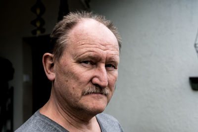 Close-up portrait of man wearing mask