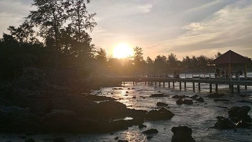 Scenic view of sea at sunset