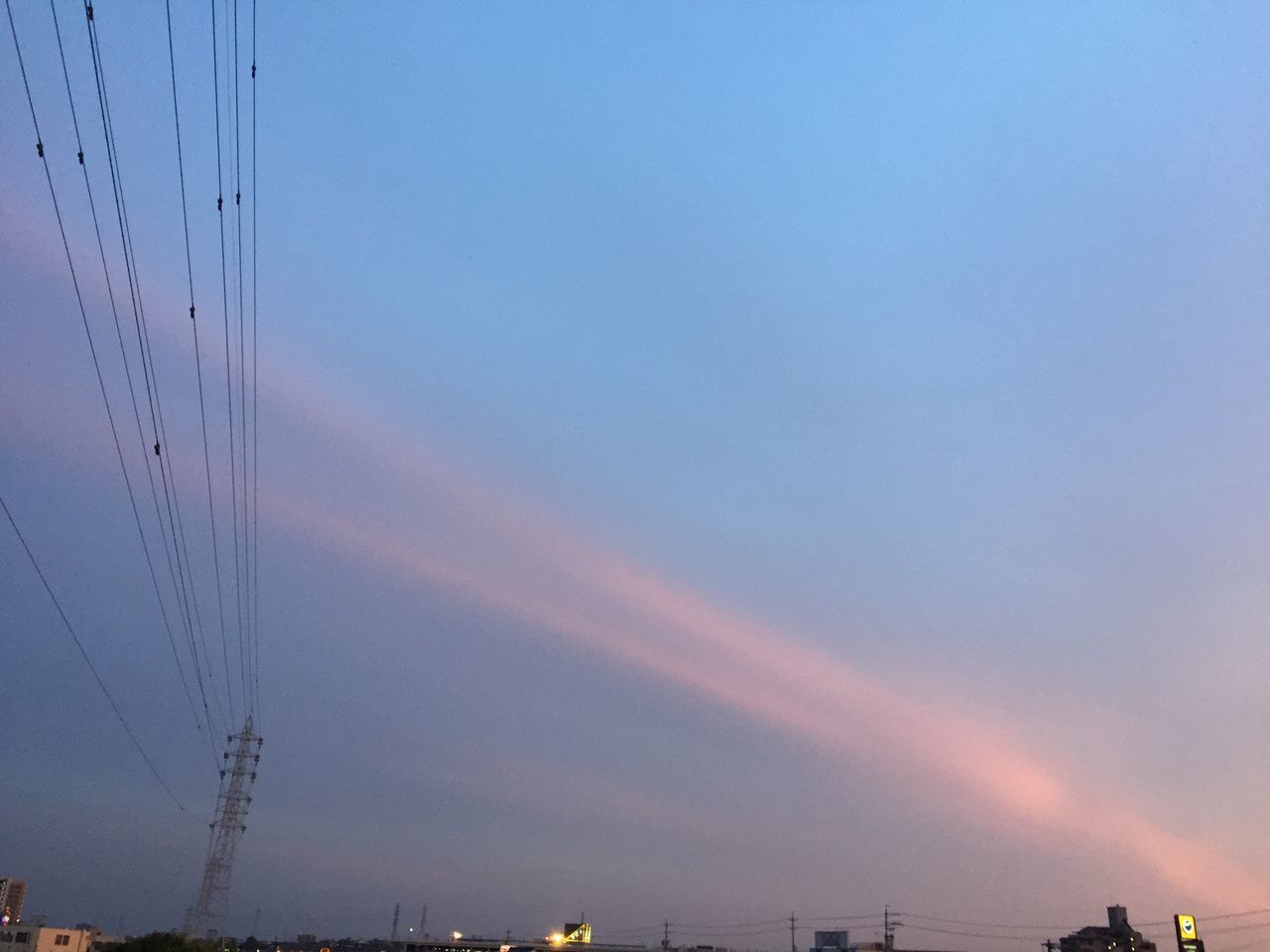 sky, sunset, silhouette, scenics, built structure, beauty in nature, dusk, electricity pylon, power line, nature, building exterior, rainbow, electricity, cloud - sky, architecture, low angle view, tranquility, copy space, tranquil scene, connection