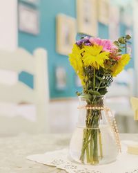 Close-up of flower vase on table