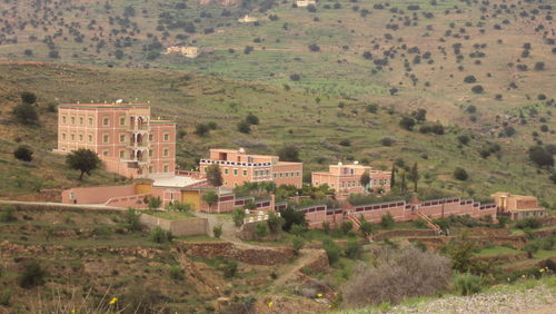 High angle view of buildings on field