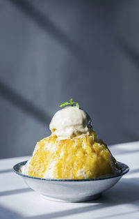 Close-up of ice cream in bowl on table