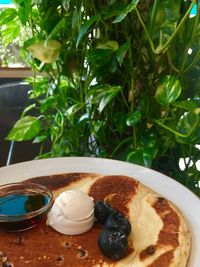 Close-up of breakfast served on table
