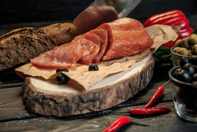 Close-up of meat on cutting board