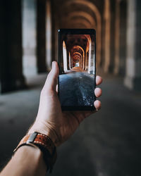 Close-up of hand holding smart phone