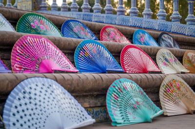 Colorful folding fans for sale in market