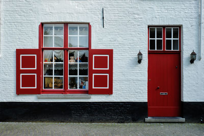 Red closed door of building