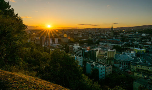 High angle view of townscape against sky during sunset