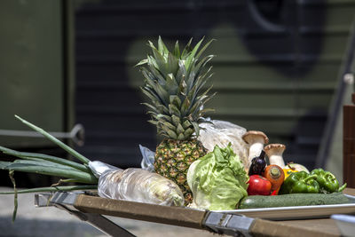 Various fruits and vegetables on table during camping