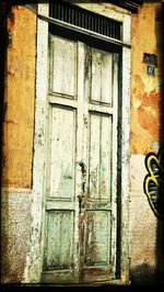 Closed door of old building