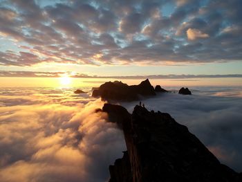 Scenic view of sea against dramatic sky