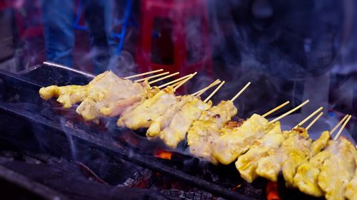 Close-up of meat on barbecue grill