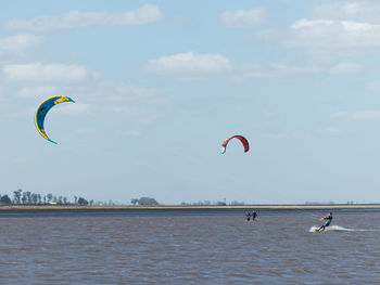 Kitesurfers in beautiful beach