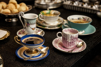 High angle view of tea cups on table