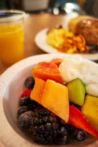 Close-up of fruits in plate on table