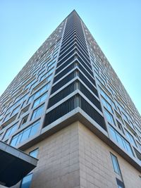 Low angle view of modern buildings against clear sky trump tower