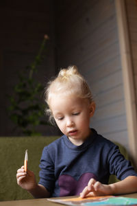 Portrait of cute girl using mobile phone