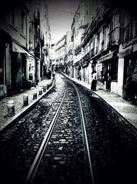 Railroad track at railroad station platform