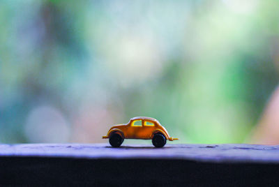 Close-up of toy car on table