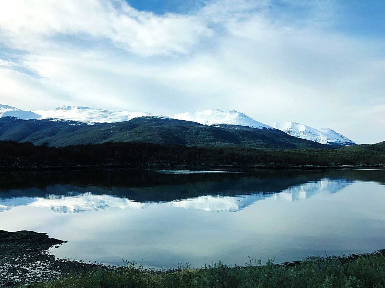 mountain, lake, reflection, water, beauty in nature, tranquil scene, nature, sky, scenics, outdoors, day, landscape, waterfront, no people, mountain range, snow, tranquility, tree