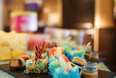 Multi colored cake on table