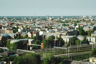 High angle view of buildings in city against sky