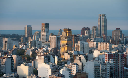 Modern buildings in city against sky