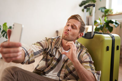 Young man using mobile phone