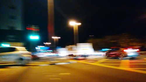 Traffic on city street at night