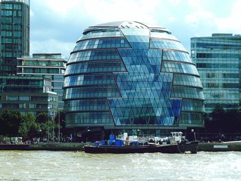 Buildings in city against sky