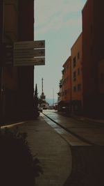 View of road along buildings