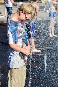 Full length of woman standing in water