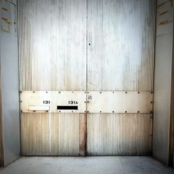 Text on closed door of building