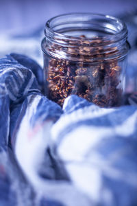 Close-up of glass jar on table