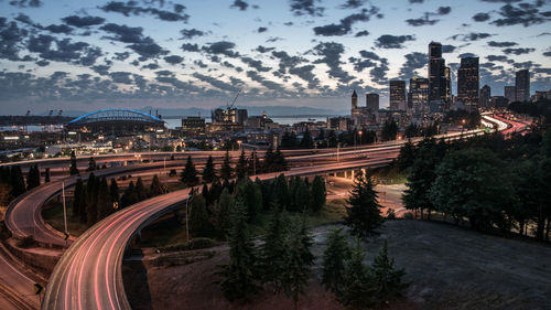 High angle view of light trails on road at night