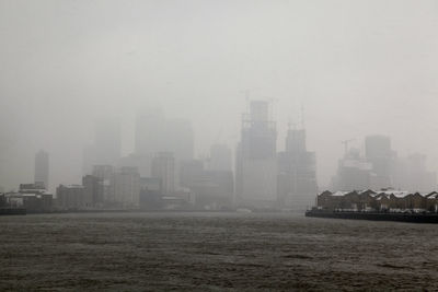 City at waterfront during winter
