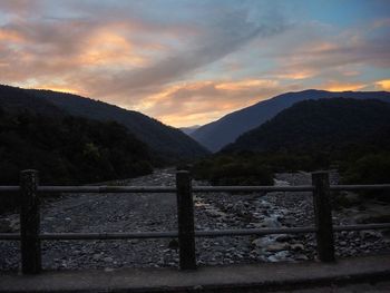Scenic view of mountains against sky during sunset