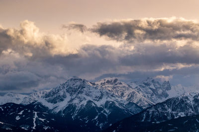 Scenic view of snowcapped mountains against sky during winter