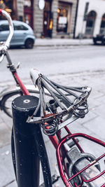 Close-up of bicycle on street