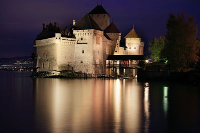 Illuminated buildings at waterfront