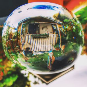 Close-up of multi colored ball on glass